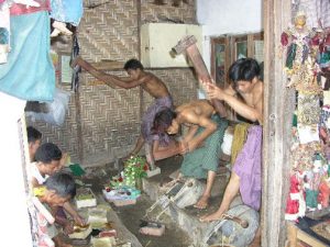 beating gold into gold leaf