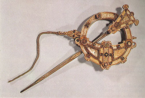 gold Tara brooch