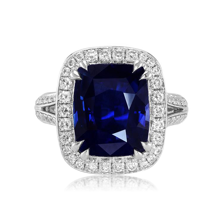 A blue sapphire ring with double claw prongs